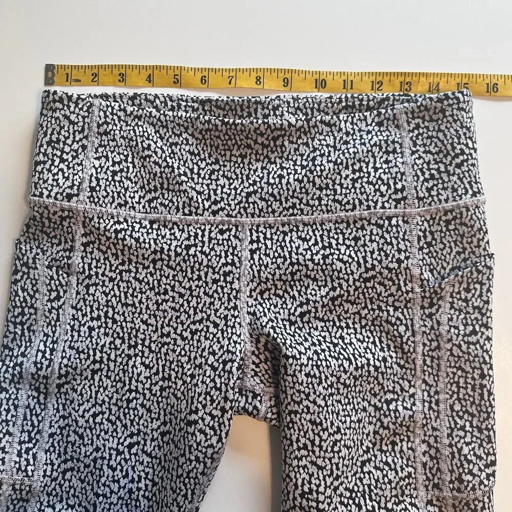Athleta Ultimate Stash Textured 7/8 Leggings Womens Large Camilla Water Violet